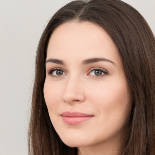 Neutral white young-adult female with long  brown hair and brown eyes