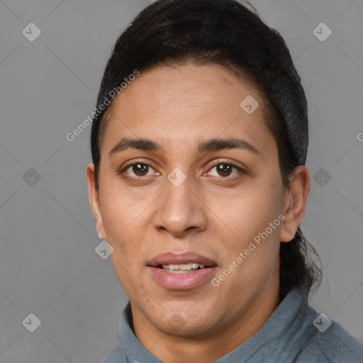 Joyful white adult female with short  brown hair and brown eyes