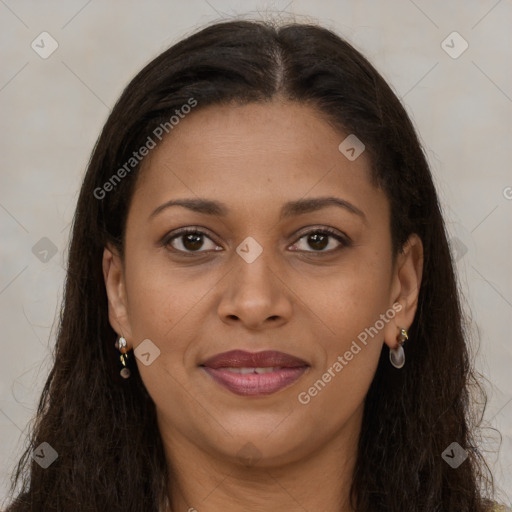 Joyful black young-adult female with long  brown hair and brown eyes