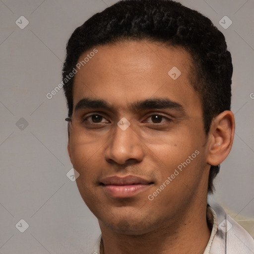 Joyful white young-adult male with short  black hair and brown eyes