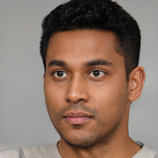 Neutral latino young-adult male with short  black hair and brown eyes