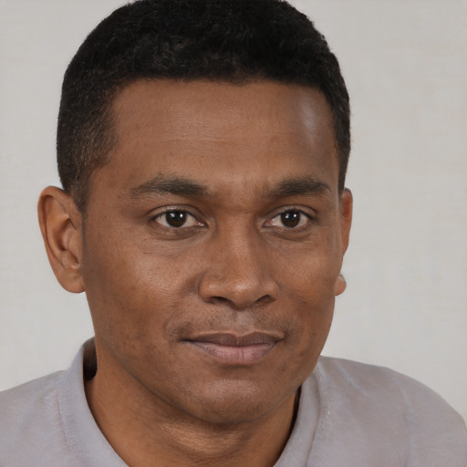 Neutral black young-adult male with short  brown hair and brown eyes