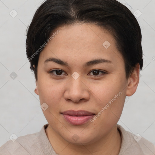 Joyful asian young-adult female with short  brown hair and brown eyes