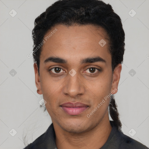 Joyful latino young-adult male with short  black hair and brown eyes