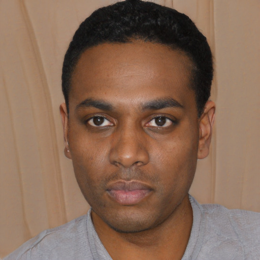 Neutral black young-adult male with short  black hair and brown eyes