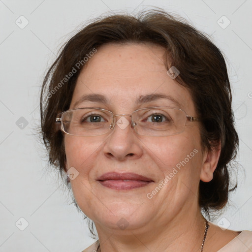 Joyful white adult female with medium  brown hair and grey eyes