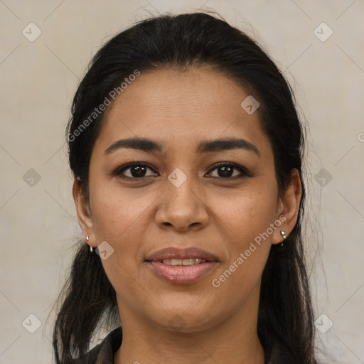 Joyful latino young-adult female with long  brown hair and brown eyes