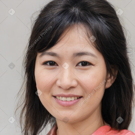 Joyful white young-adult female with medium  brown hair and brown eyes