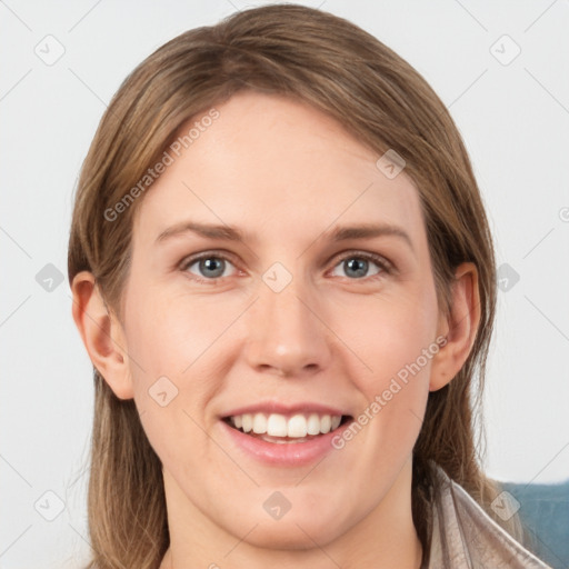 Joyful white young-adult female with long  brown hair and grey eyes