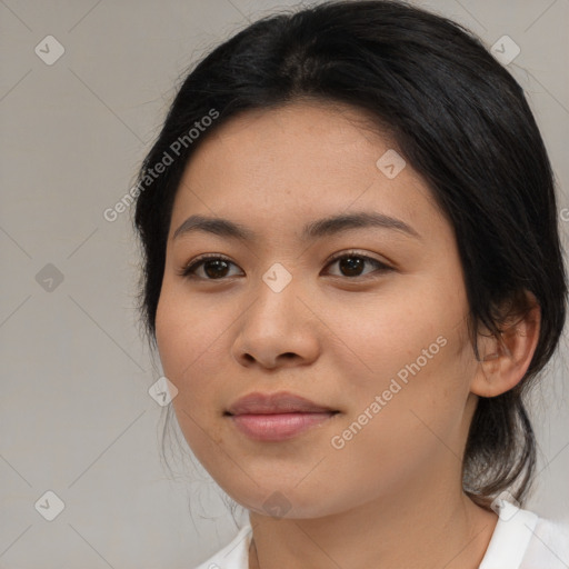 Joyful asian young-adult female with medium  brown hair and brown eyes