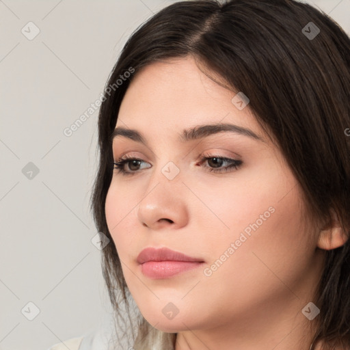 Neutral white young-adult female with medium  brown hair and brown eyes