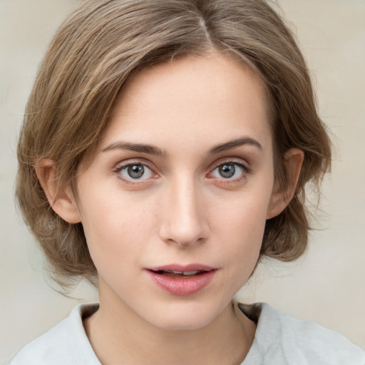 Neutral white young-adult female with medium  brown hair and grey eyes