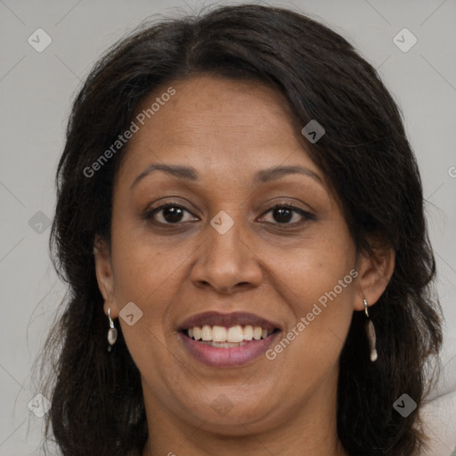 Joyful white adult female with long  brown hair and brown eyes