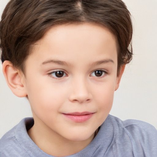 Joyful white child female with short  brown hair and brown eyes