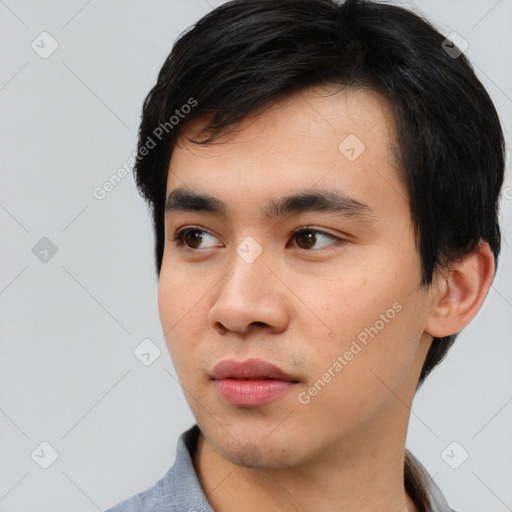 Neutral asian young-adult male with short  black hair and brown eyes