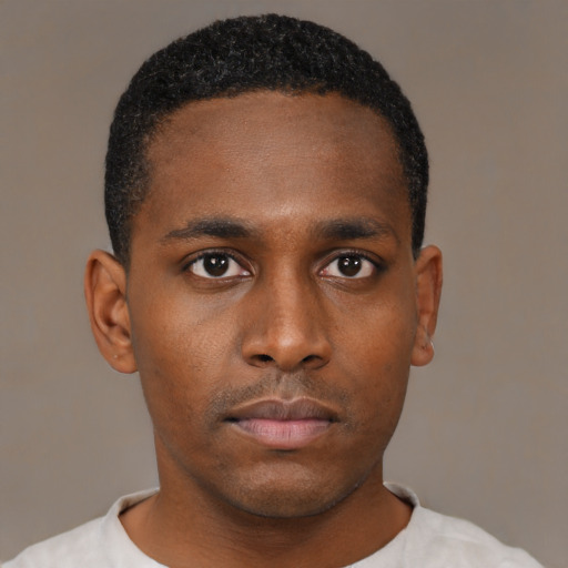 Neutral black young-adult male with short  black hair and brown eyes