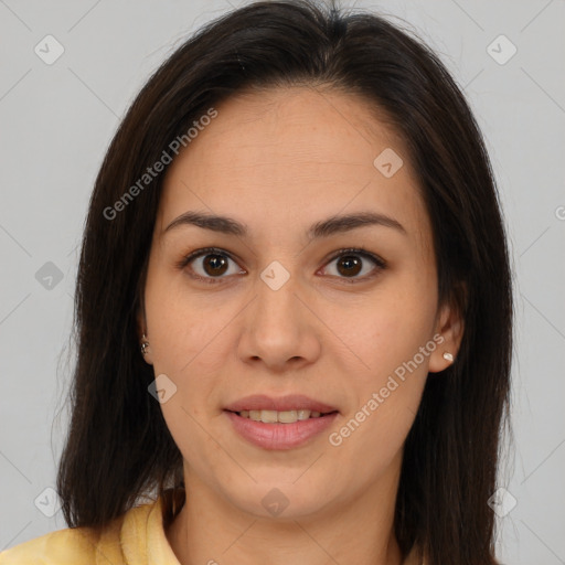 Joyful latino young-adult female with medium  brown hair and brown eyes