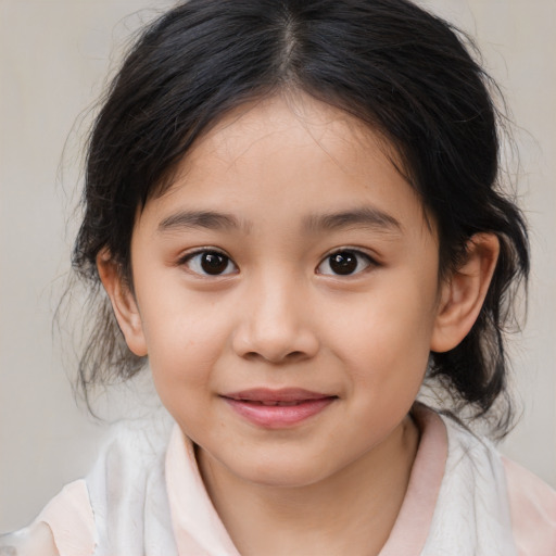 Joyful white child female with medium  brown hair and brown eyes