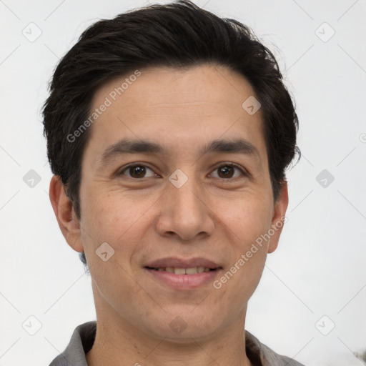 Joyful white adult male with short  brown hair and brown eyes