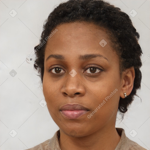 Neutral black young-adult female with short  brown hair and brown eyes