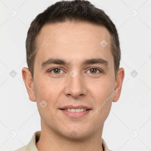 Joyful white young-adult male with short  brown hair and brown eyes