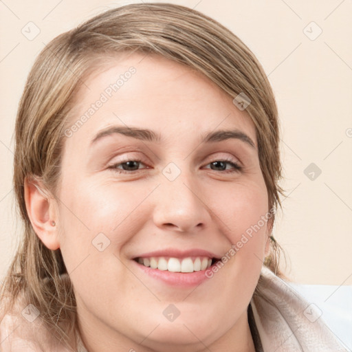 Joyful white young-adult female with medium  brown hair and blue eyes