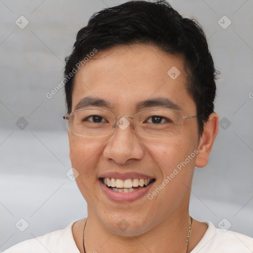 Joyful white adult male with short  brown hair and brown eyes