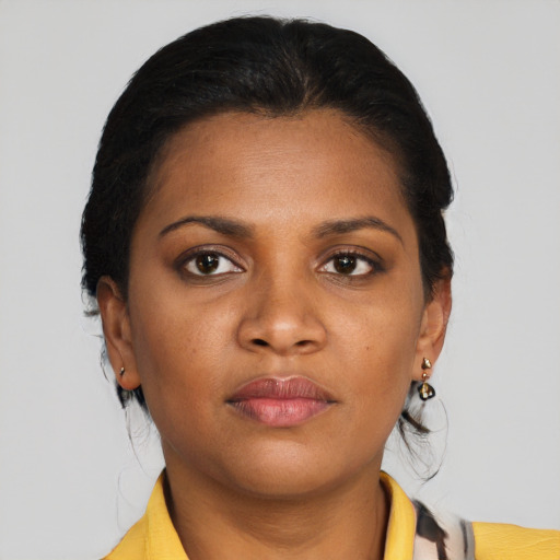 Neutral black young-adult female with short  brown hair and brown eyes