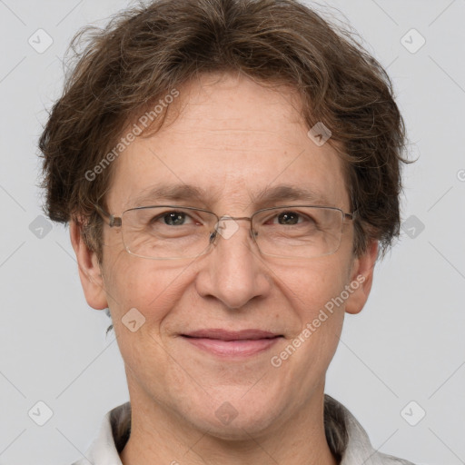 Joyful white middle-aged male with short  brown hair and brown eyes