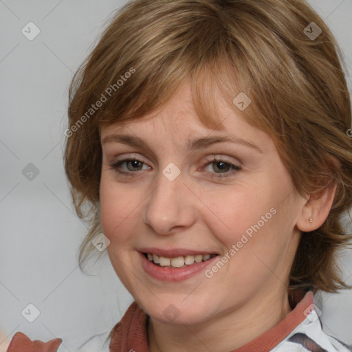 Joyful white young-adult female with medium  brown hair and blue eyes