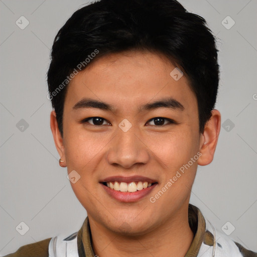 Joyful asian young-adult male with short  black hair and brown eyes