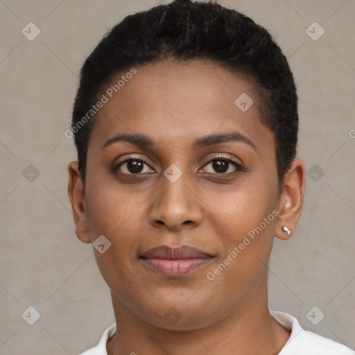 Joyful black young-adult female with short  brown hair and brown eyes