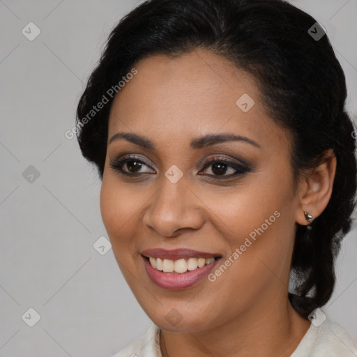 Joyful latino young-adult female with medium  brown hair and brown eyes