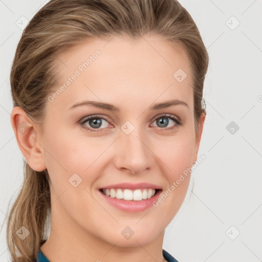 Joyful white young-adult female with medium  brown hair and blue eyes