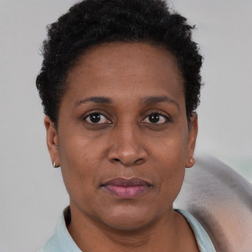 Neutral black young-adult female with short  brown hair and brown eyes