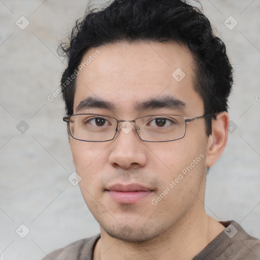 Neutral asian young-adult male with short  black hair and brown eyes