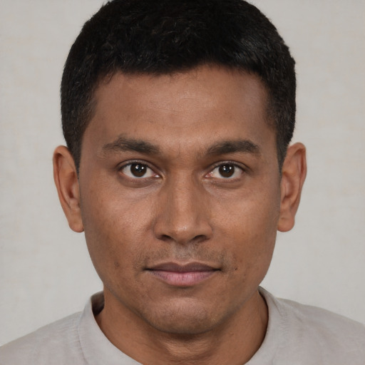 Neutral black young-adult male with short  brown hair and brown eyes