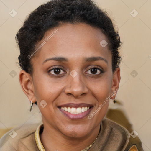 Joyful latino young-adult female with short  brown hair and brown eyes