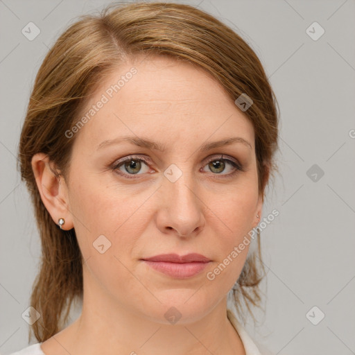 Joyful white young-adult female with medium  brown hair and green eyes