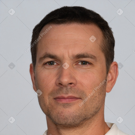 Neutral white adult male with short  brown hair and brown eyes