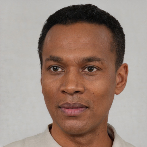 Neutral black adult male with short  black hair and brown eyes