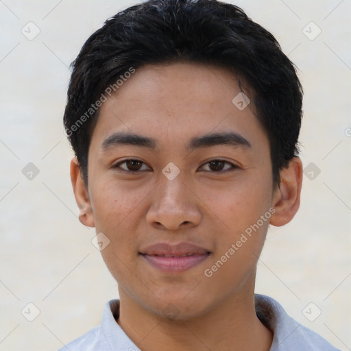 Joyful asian young-adult male with short  brown hair and brown eyes