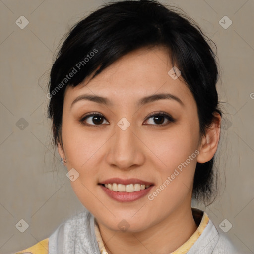 Joyful asian young-adult female with medium  brown hair and brown eyes