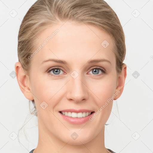 Joyful white young-adult female with medium  brown hair and blue eyes