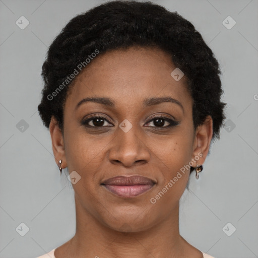 Joyful black young-adult female with short  black hair and brown eyes