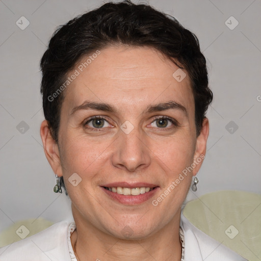 Joyful white adult female with short  brown hair and brown eyes