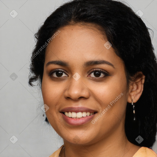 Joyful latino young-adult female with long  black hair and brown eyes