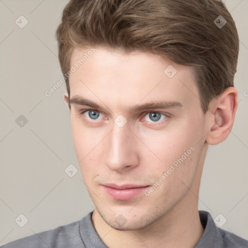 Neutral white young-adult male with short  brown hair and grey eyes