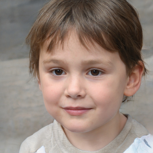 Joyful white child male with short  brown hair and brown eyes