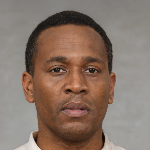 Neutral black young-adult male with short  brown hair and brown eyes